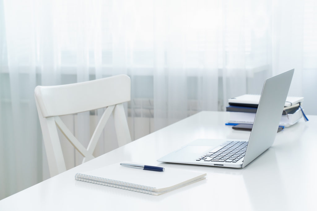 Yonkers New York Business Lawyer, Estate Planning Attorney White Desk and Laptop