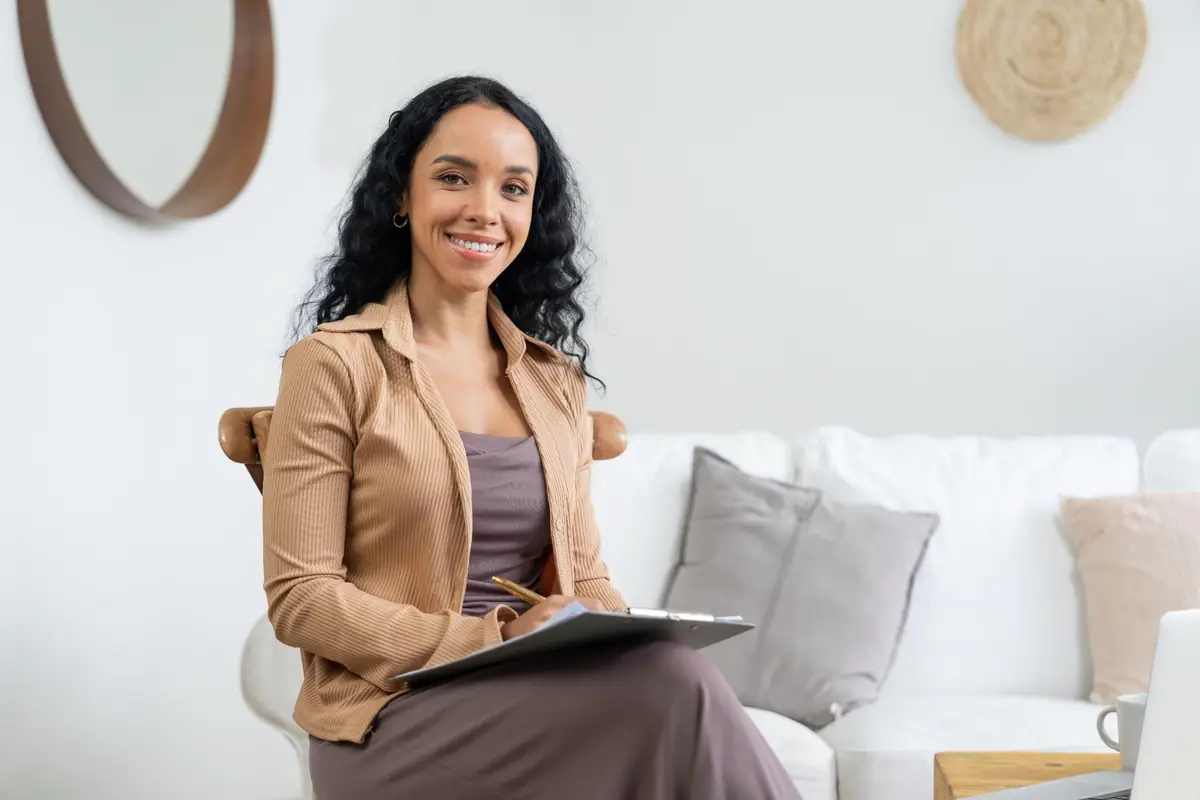 Therapist without a PLLC in New York in her private practice office